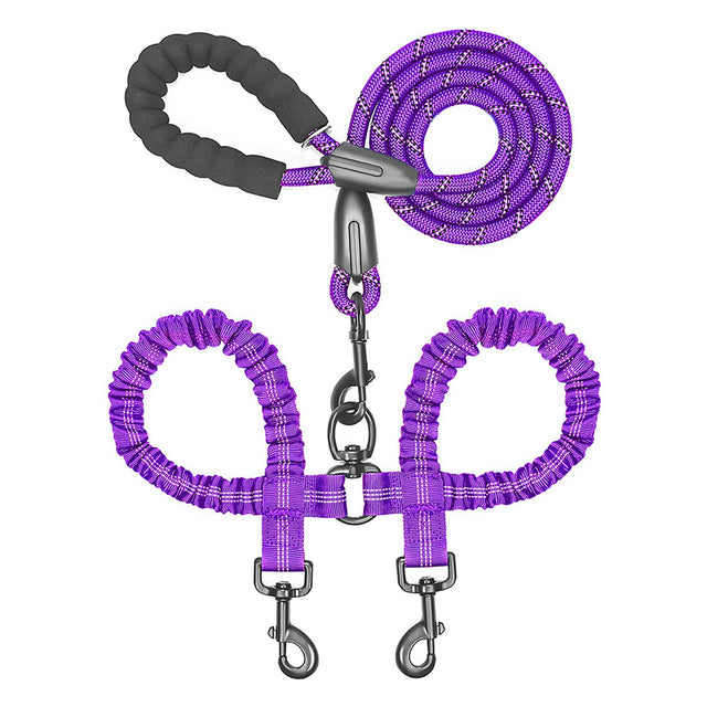 Double dog leash coupler by Zuka & Co. designed for walking two dogs, featuring durable clips and adjustable length.