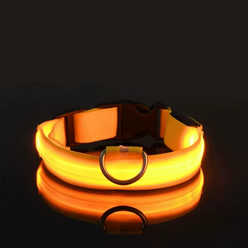 GlowPup™ LED dog collar by Zuka & Co. waterproof, adjustable collar with 3 flash modes and durable leash ring in XS to XL sizes.