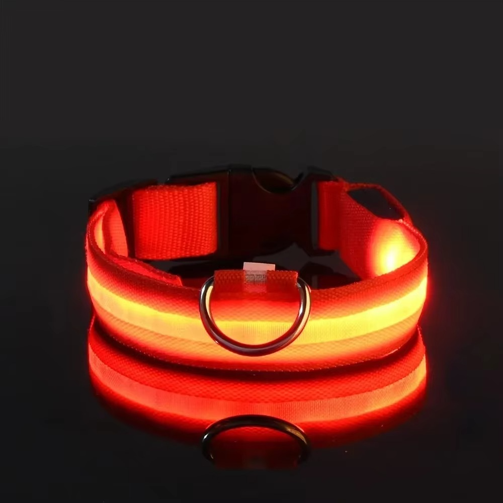GlowPup™ LED dog collar by Zuka & Co. waterproof, adjustable collar with 3 flash modes and sturdy leash ring in XS–XL size.