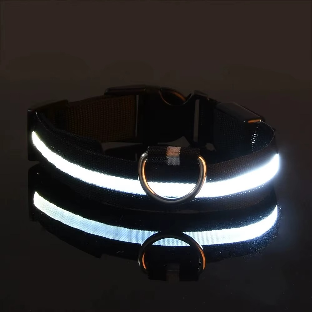 GlowPup™ LED light-up dog collar by Zuka & Co. waterproof, adjustable with 3 flash modes and sturdy leash ring in XS–XL sizes.
