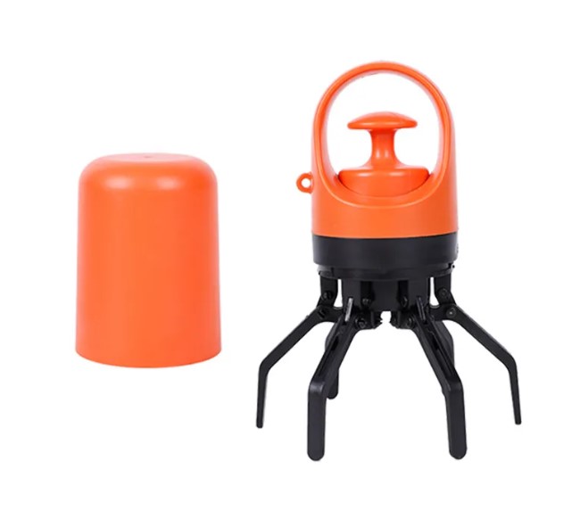Zuka & Co. dog pooper scooper with a sturdy handle and scoop, designed for easy waste clean-up in outdoor spaces.